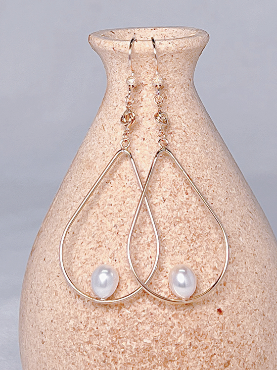 pearl drop statement earrings