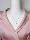 13.5mm White Freshwater Coin Pearl Necklace in 14K Gold Filled on Model Wearing Pink Blouse